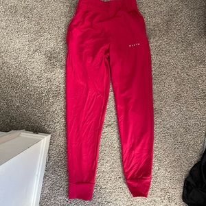 Red NVGTN joggers size medium